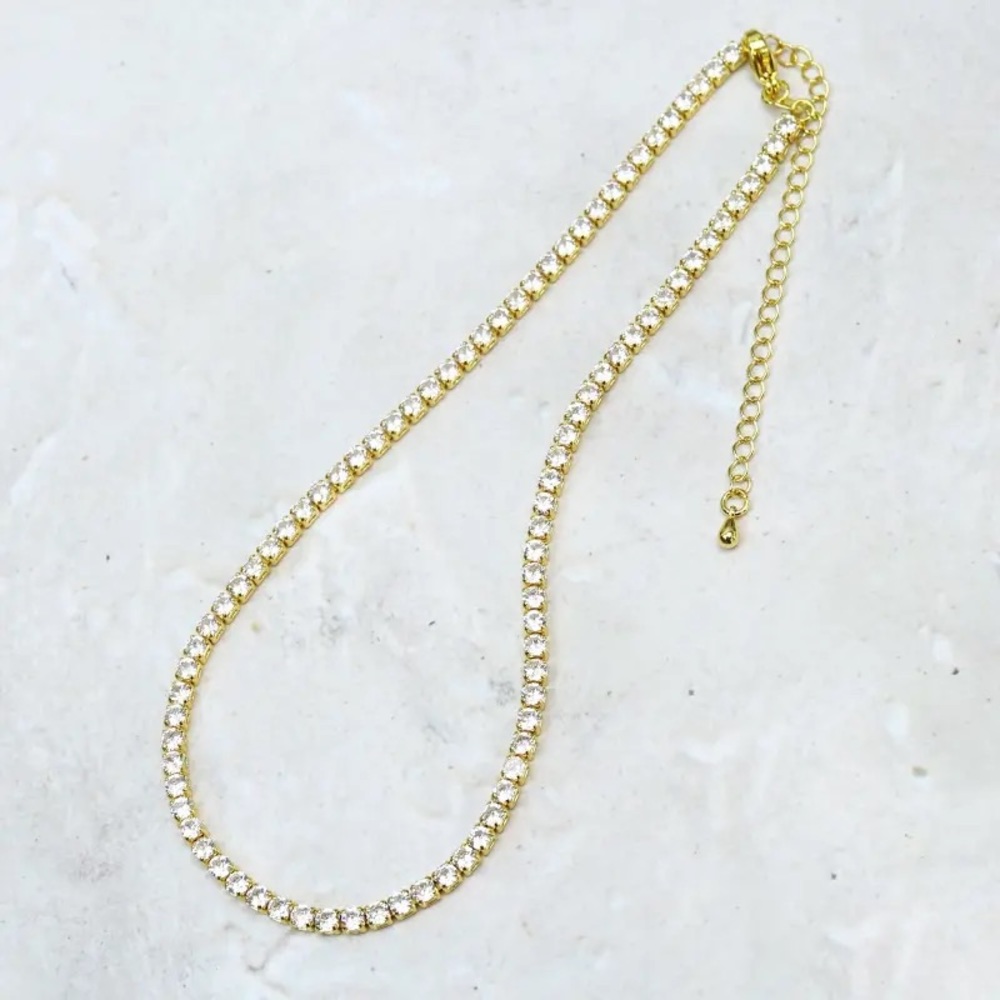 Brand new Anthropologie tennis necklace. Gold and silver color.